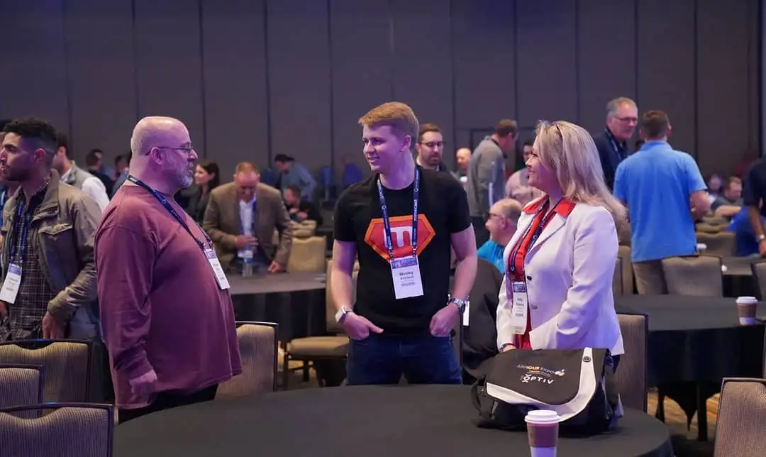 Me at the conference talking with a few people